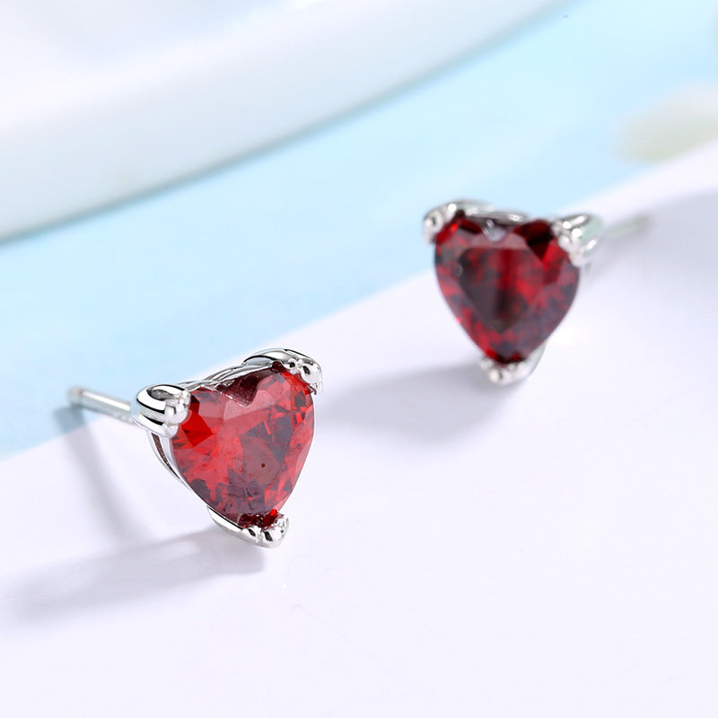 Women's earrings with sparkling heart accents made of high-quality stainless steel Land Girl