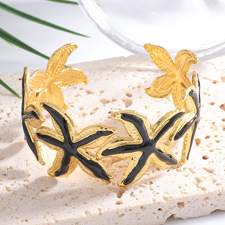 Ladies Open Cuff Bracelet with Expressive Star Motif Land Girl