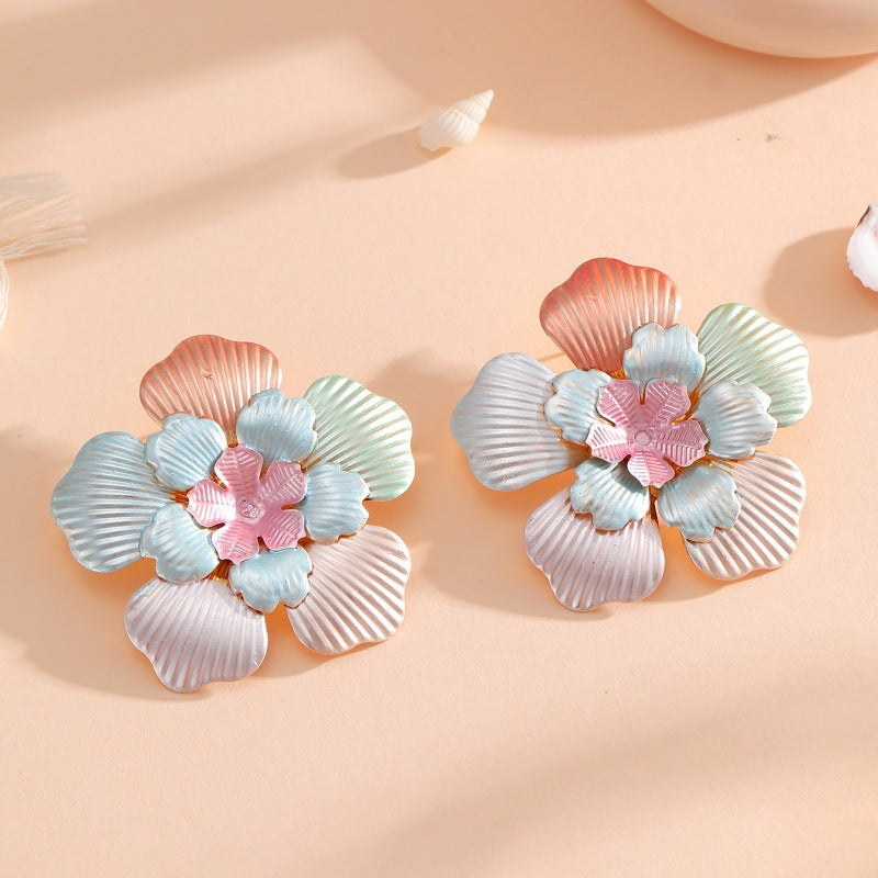 Ladies' flower earrings with intricate design and glossy accents Land Girl