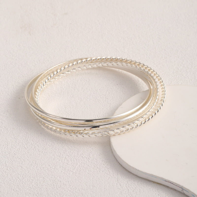 Women's bangle set with elaborate, braided and simple designs Land Girl