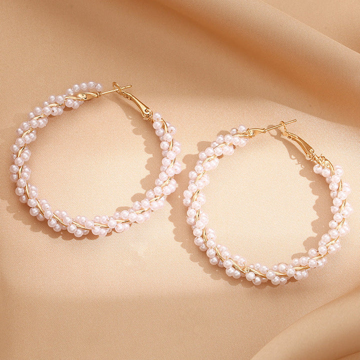 Ladies hoop earrings with luxurious pearl accents and elegant, twisted design Land Girl