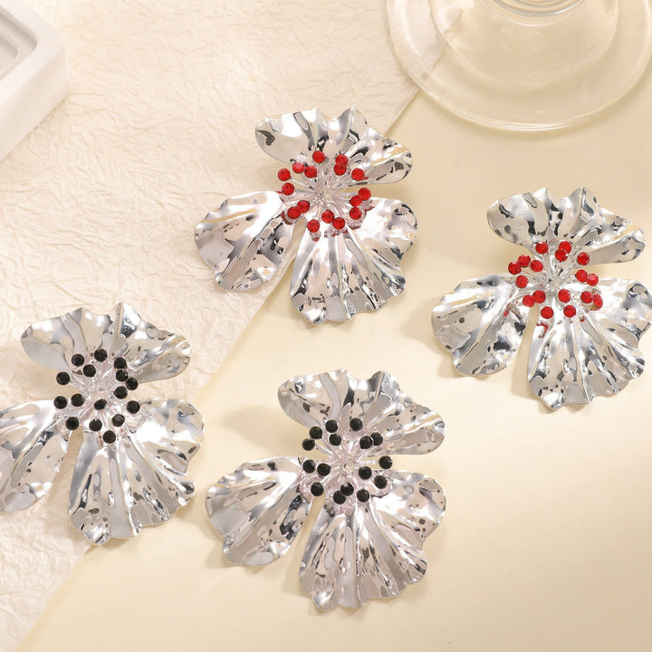 Women’s metal flower earrings with sparkling red accents Land Girl