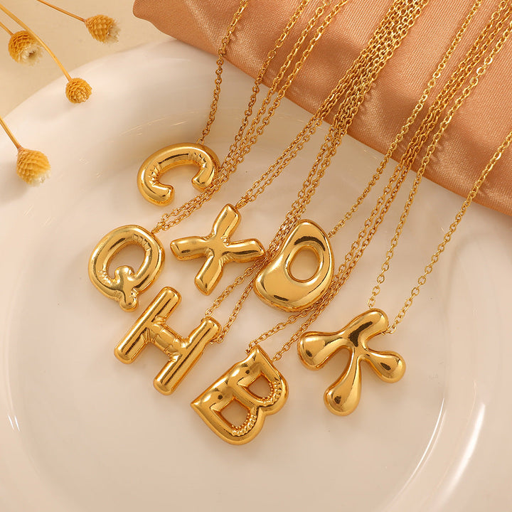 Women's necklace with curved letter pendant Land Girl