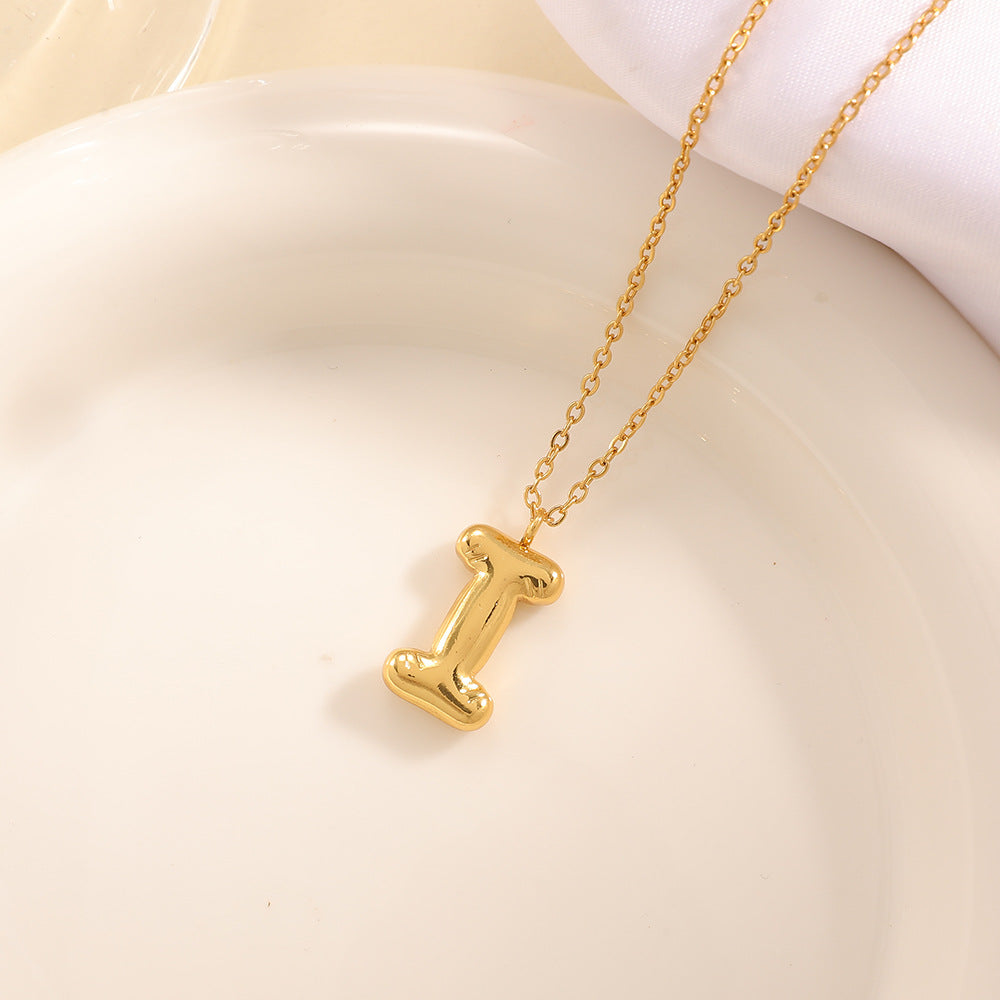 Women's necklace with curved letter pendant Land Girl