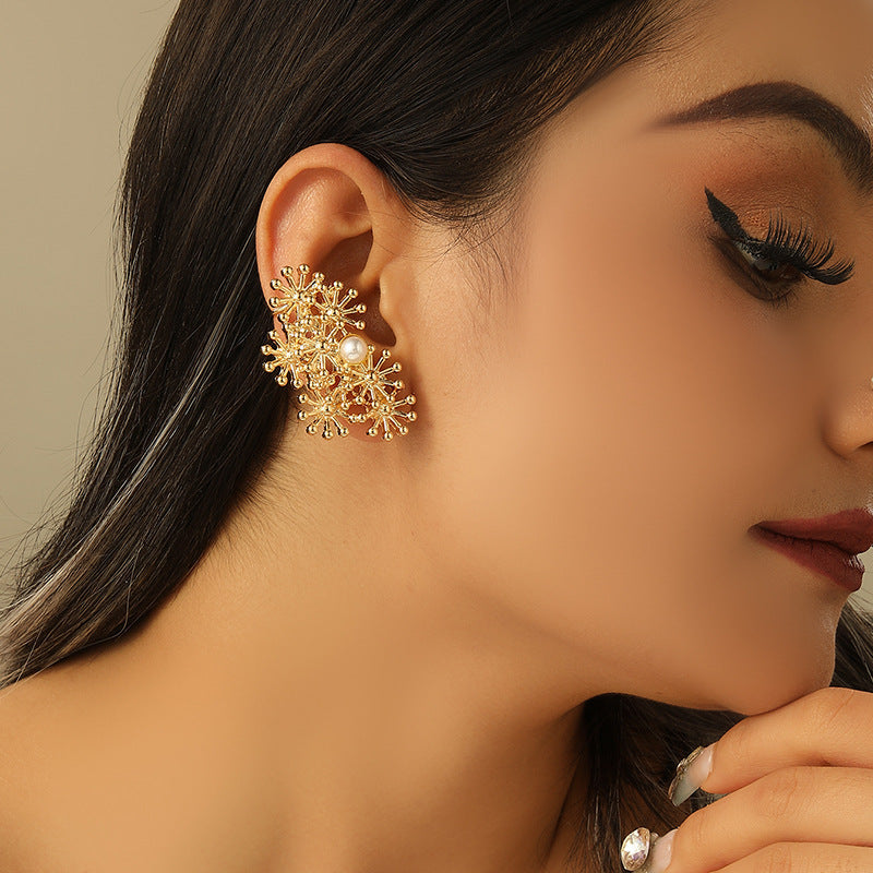 Women’s ear clips with elaborate flower design and pearl accent Land Girl
