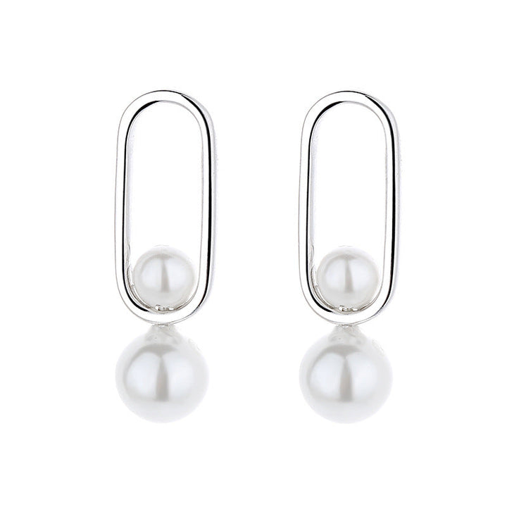 Women's stud earrings with modern oval design and elegant pearls Land Girl