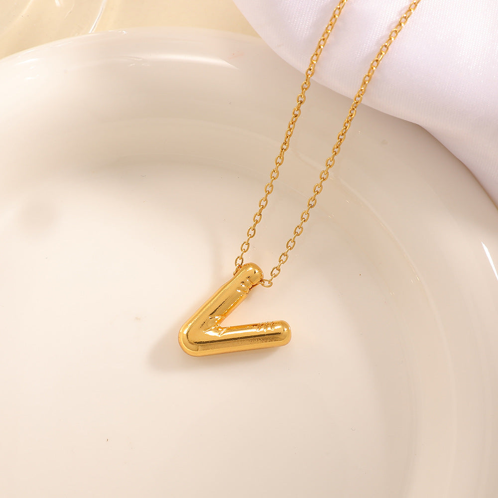 Women's necklace with curved letter pendant Land Girl