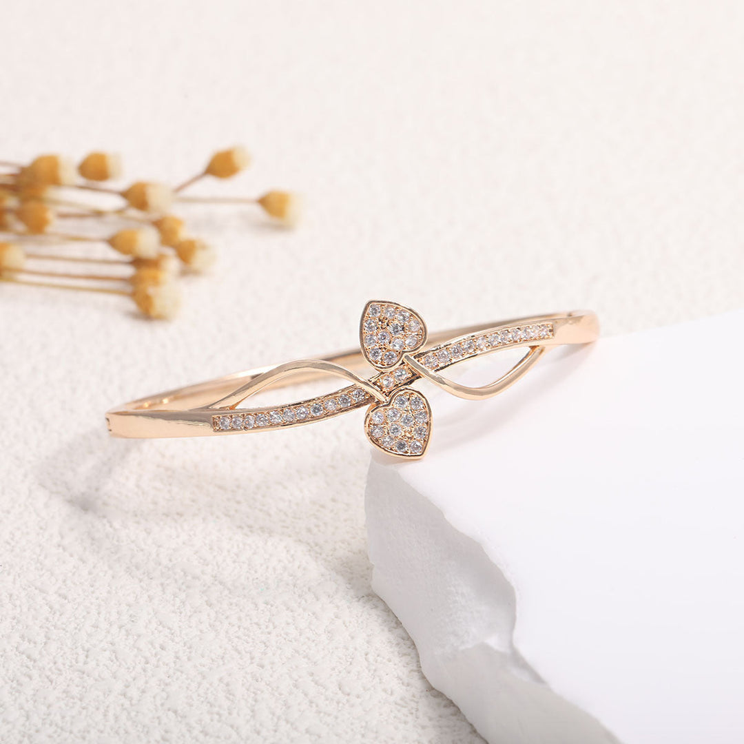 Women's bangle with elegant infinity pattern and sparkling zirconia Land Girl