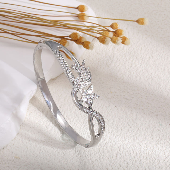Women's bangle with elegant infinity pattern and sparkling zirconia Land Girl