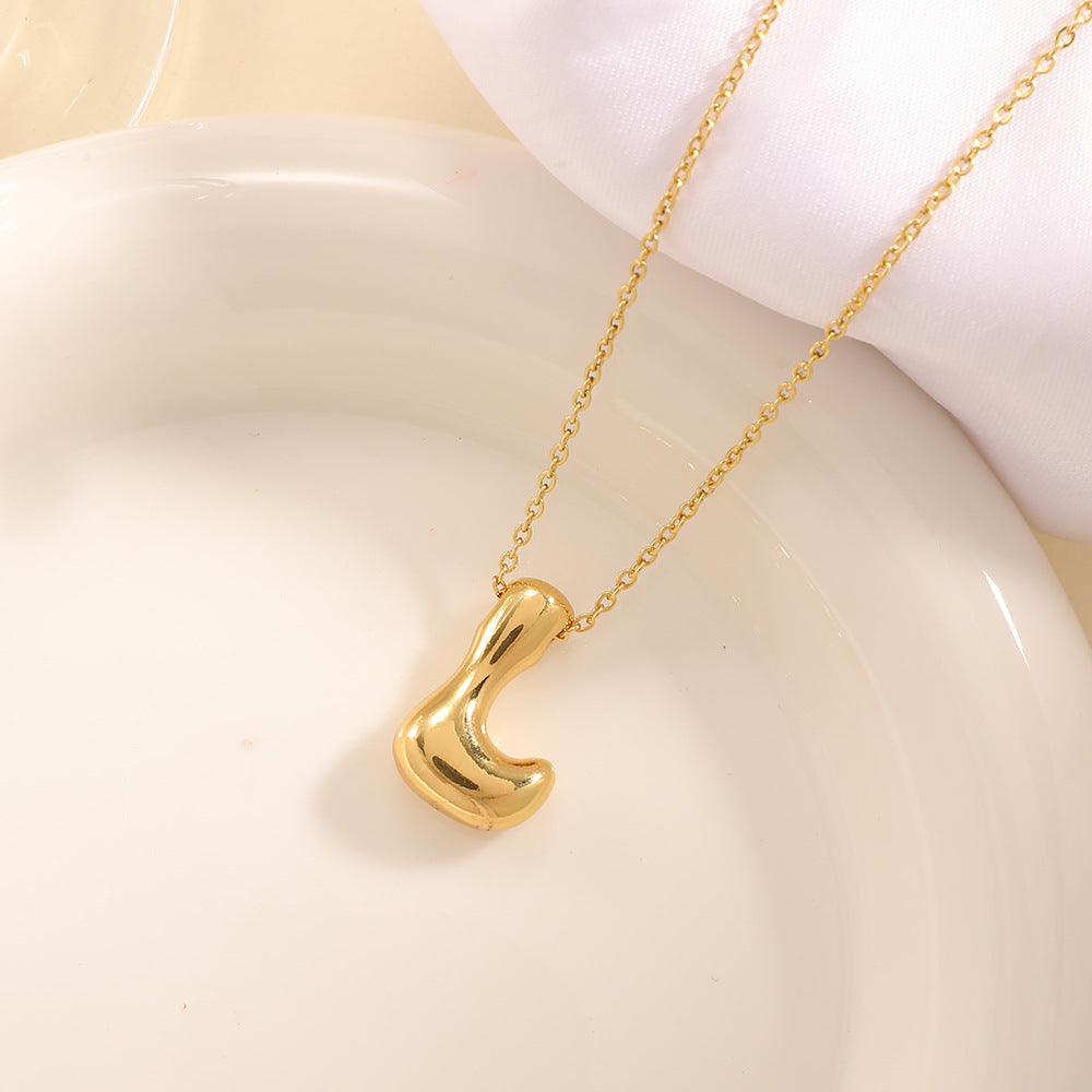 Women's necklace with curved letter pendant Land Girl