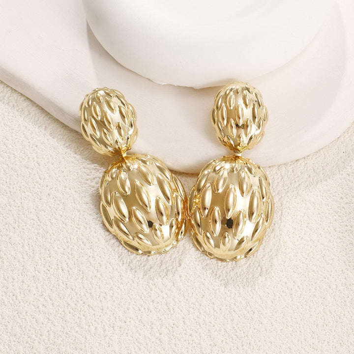 Women's earrings in artistic, structured design Land Girl