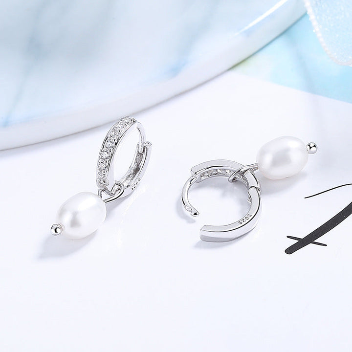 Ladies earrings with elegant zirconia decorations and pearl pendants Land Girl