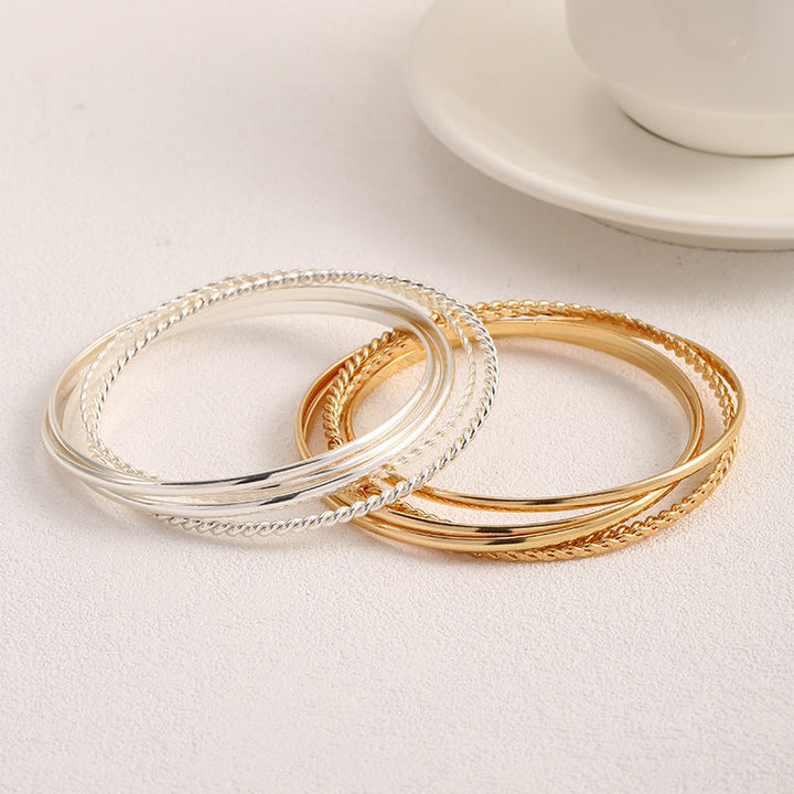 Women's bangle set with elaborate, braided and simple designs Land Girl