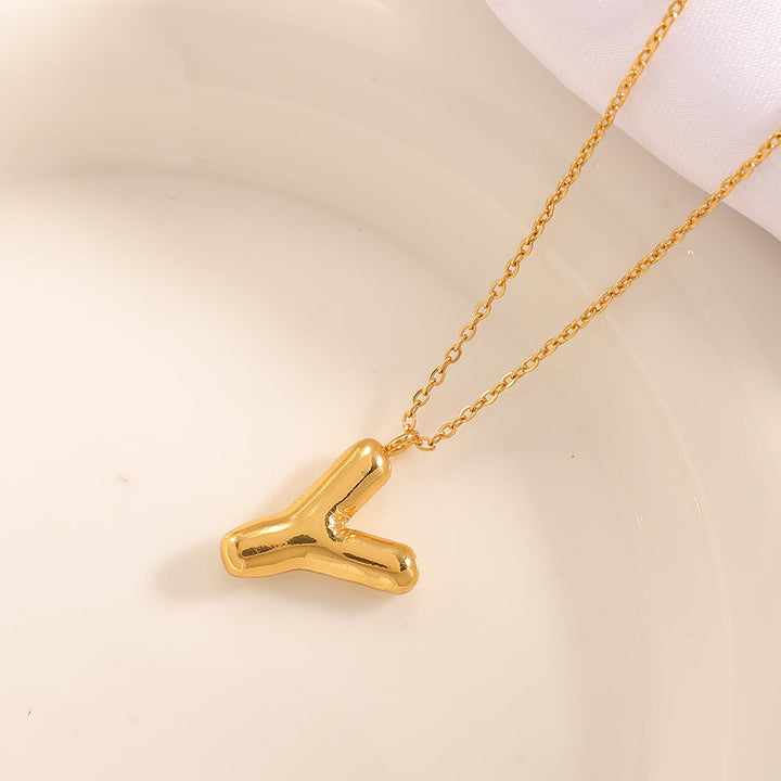Women's necklace with curved letter pendant Land Girl