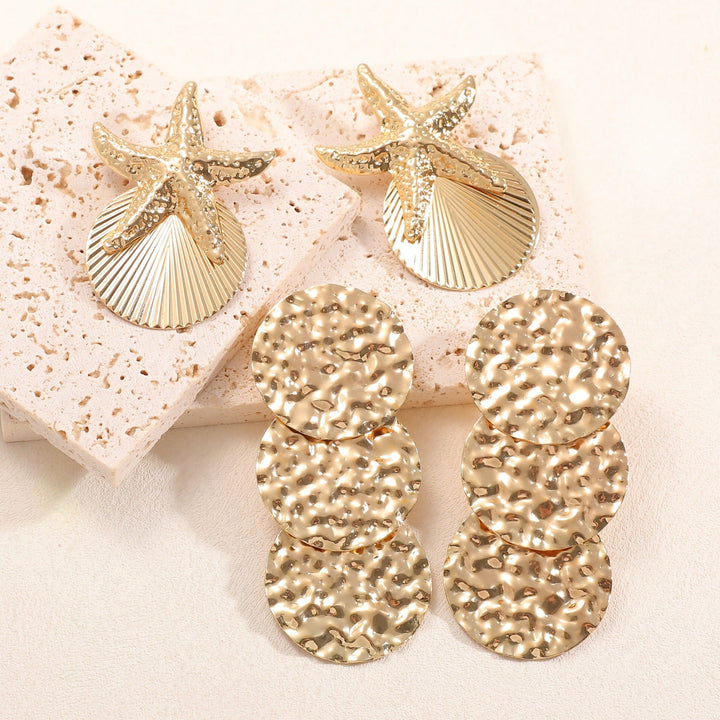 Women's ear clips in luxurious shell and starfish design Land Girl