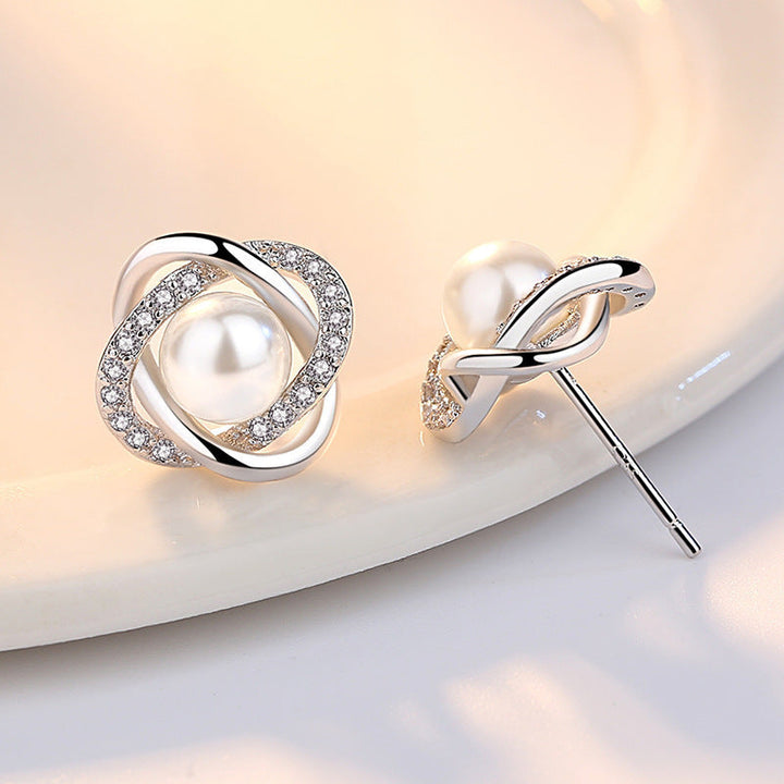 Ladies earrings with artistic pearl design and sparkling zirconia Land Girl