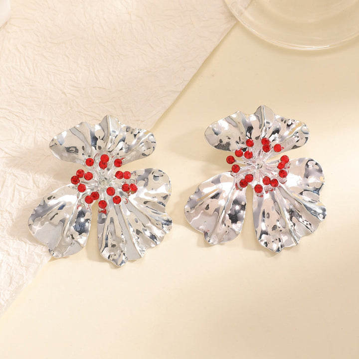 Women’s metal flower earrings with sparkling red accents Land Girl