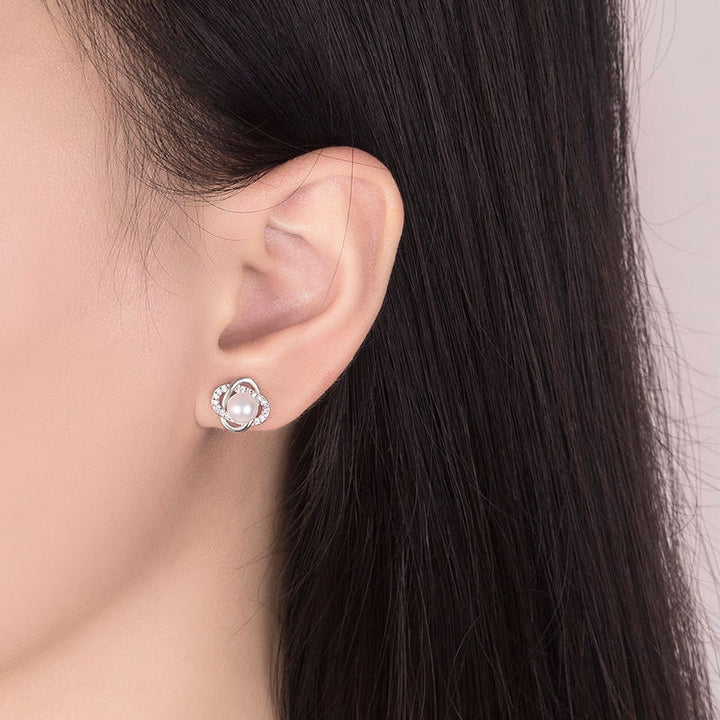 Ladies earrings with artistic pearl design and sparkling zirconia Land Girl
