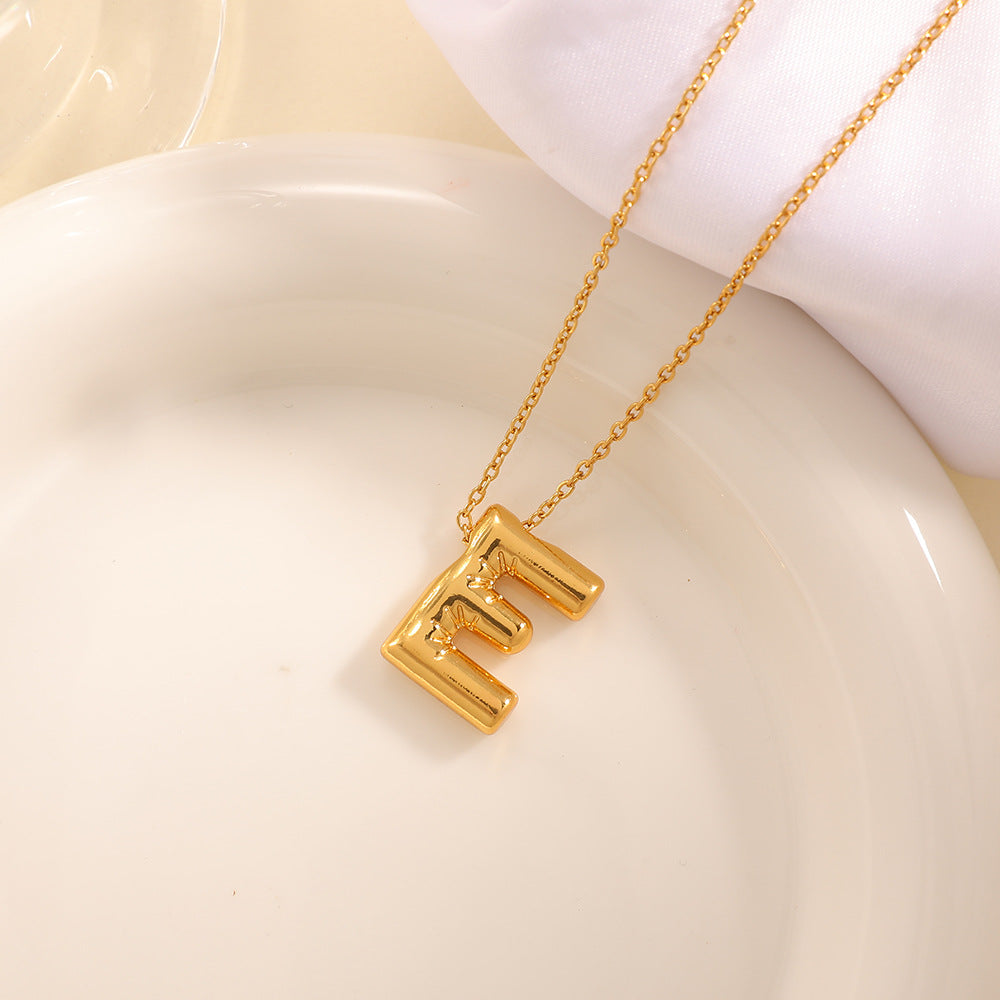 Women's necklace with curved letter pendant Land Girl