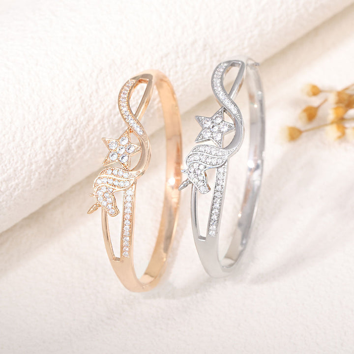 Women's bangle with elegant infinity pattern and sparkling zirconia Land Girl