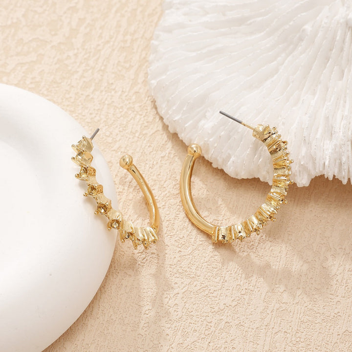 Ladies hoop earrings with intricate structures Land Girl