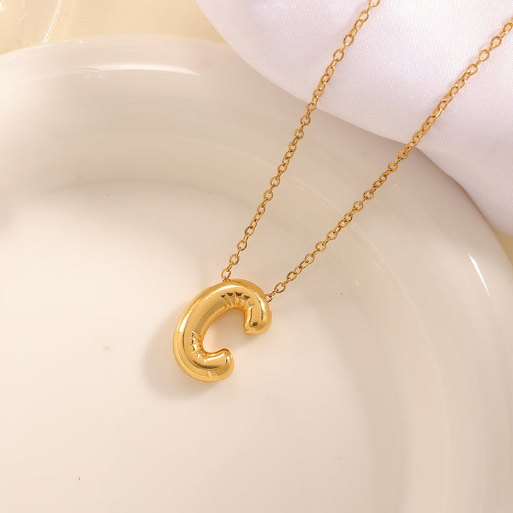 Women's necklace with curved letter pendant Land Girl