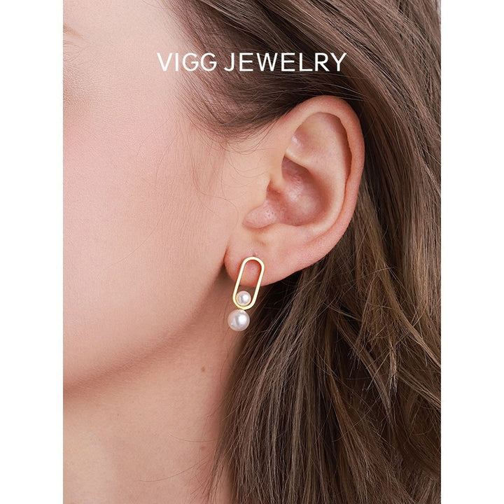Women's stud earrings with modern oval design and elegant pearls Land Girl