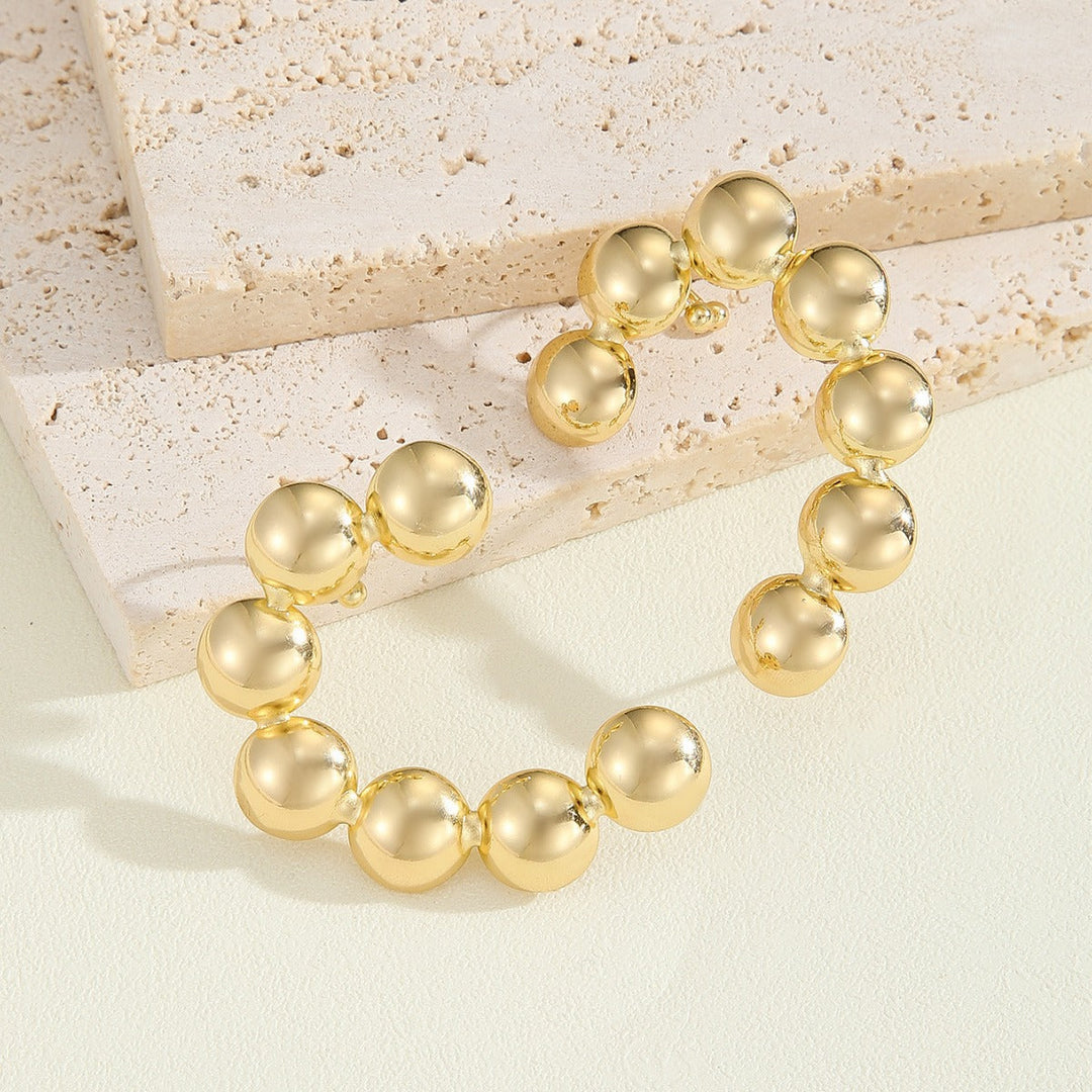 Women's bracelet with structured, golden beads Land Girl