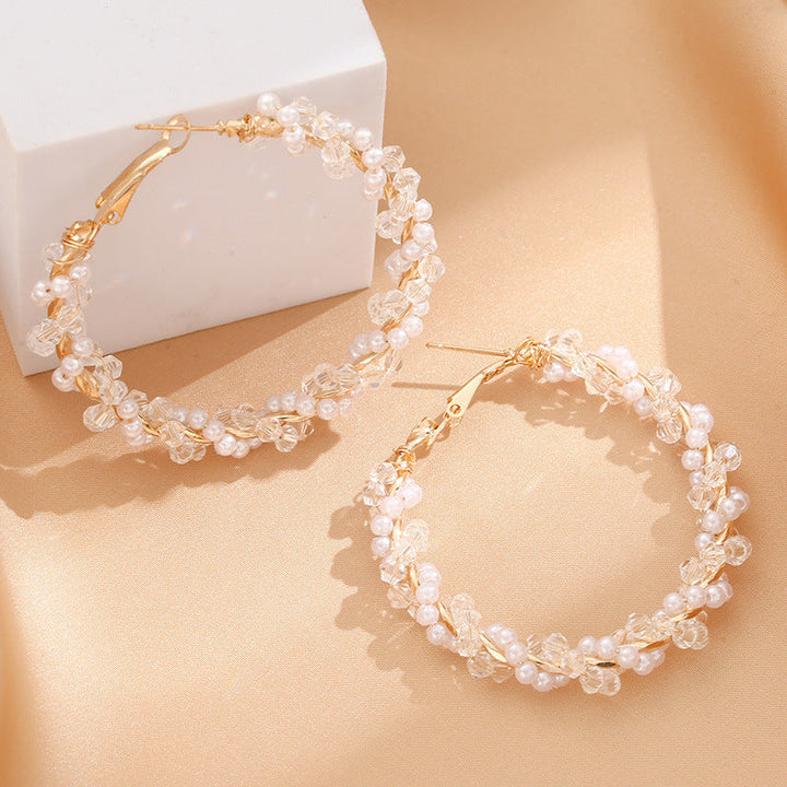 Ladies hoop earrings with luxurious pearl accents and elegant, twisted design Land Girl