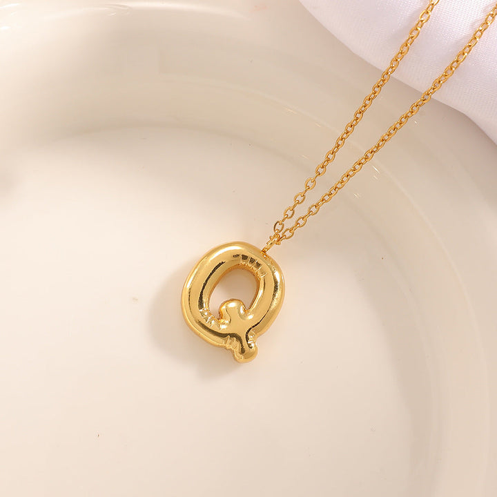 Women's necklace with curved letter pendant Land Girl