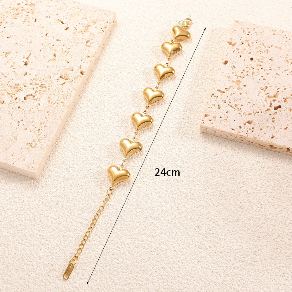 Ladies' bracelet with elegant heart design and fine link chain Land Girl