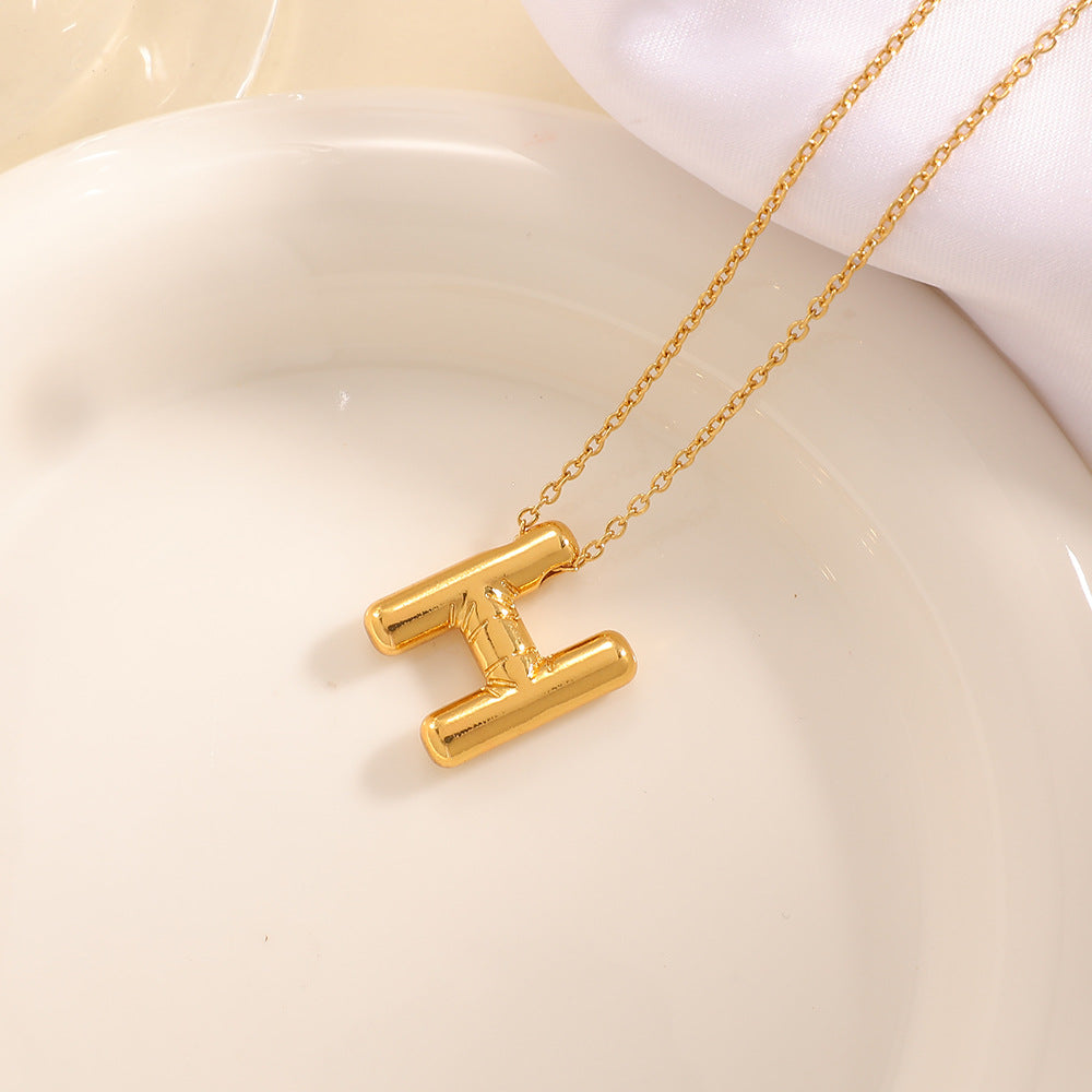 Women's necklace with curved letter pendant Land Girl