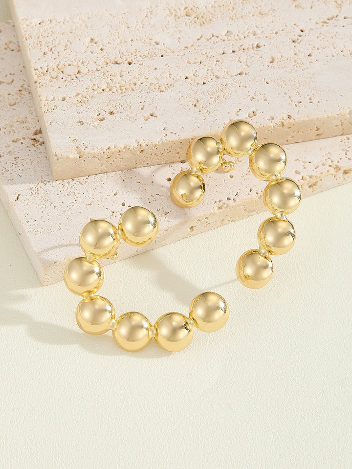 Women's bracelet with structured, golden beads Land Girl