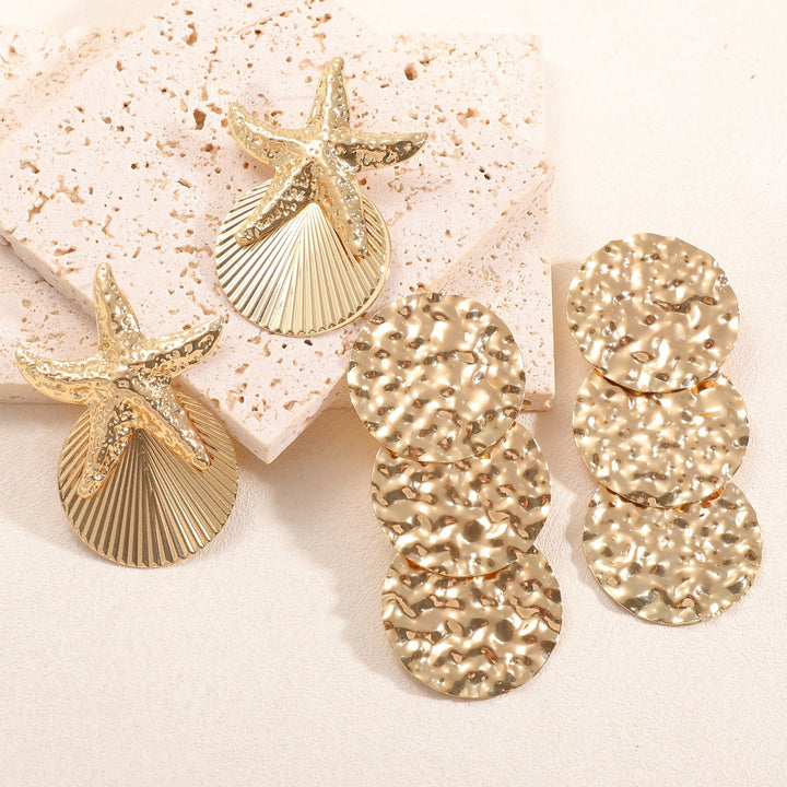Women's ear clips in luxurious shell and starfish design Land Girl