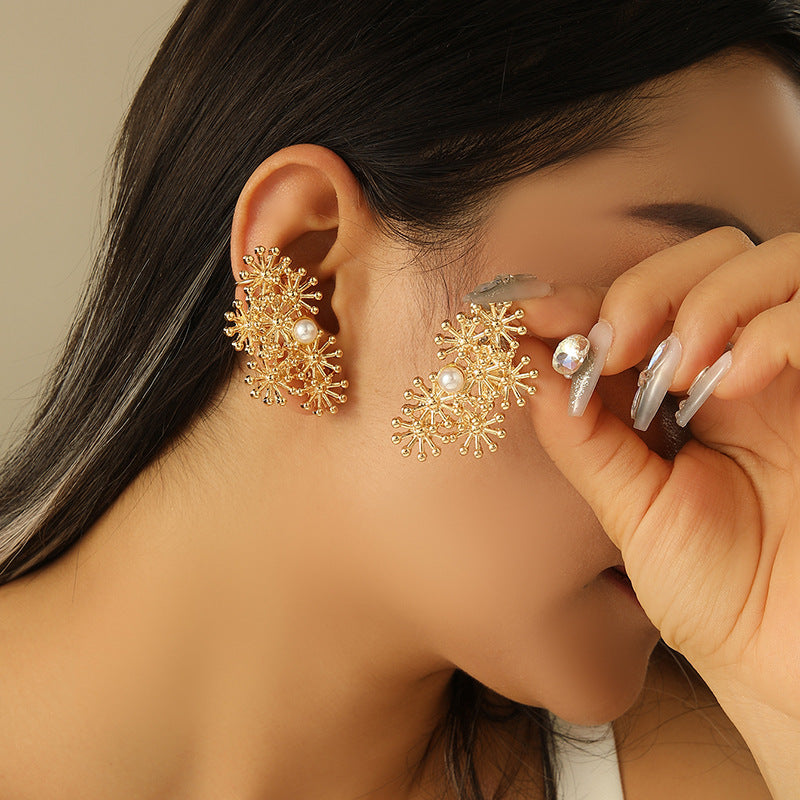 Women’s ear clips with elaborate flower design and pearl accent Land Girl