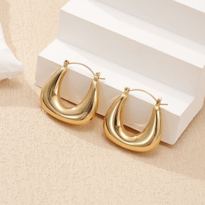 Ladies earrings in a modern, curved design Land Girl