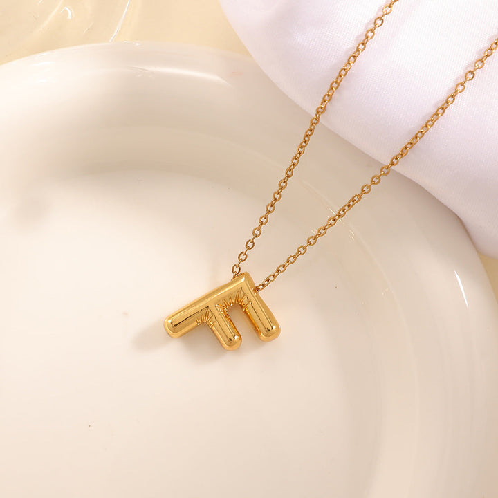 Women's necklace with curved letter pendant Land Girl