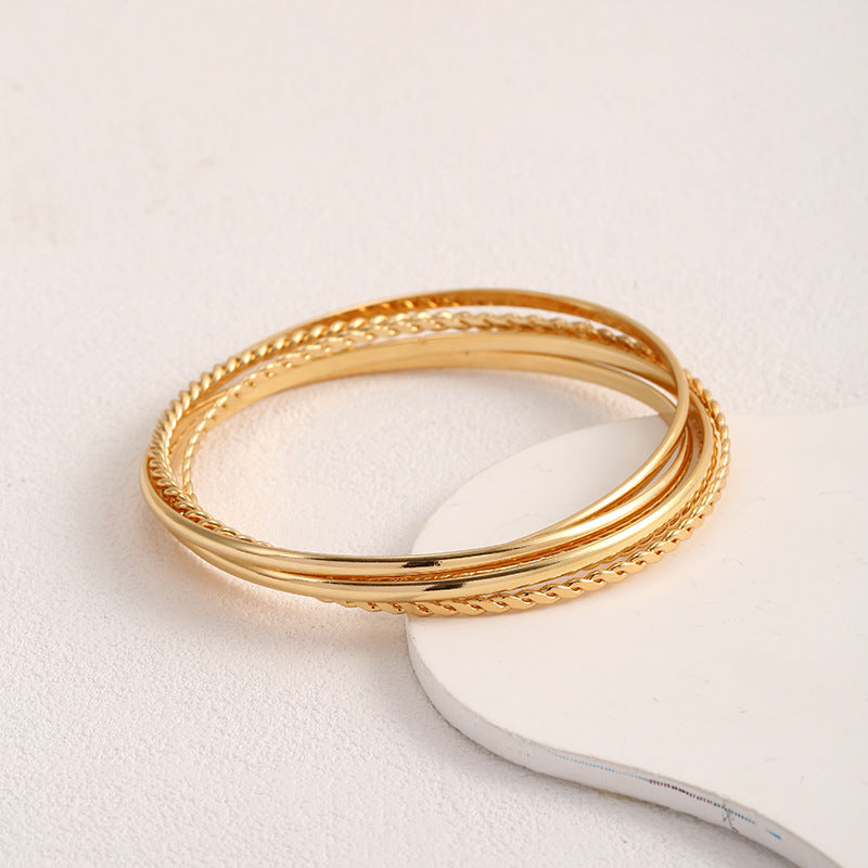 Women's bangle set with elaborate, braided and simple designs Land Girl
