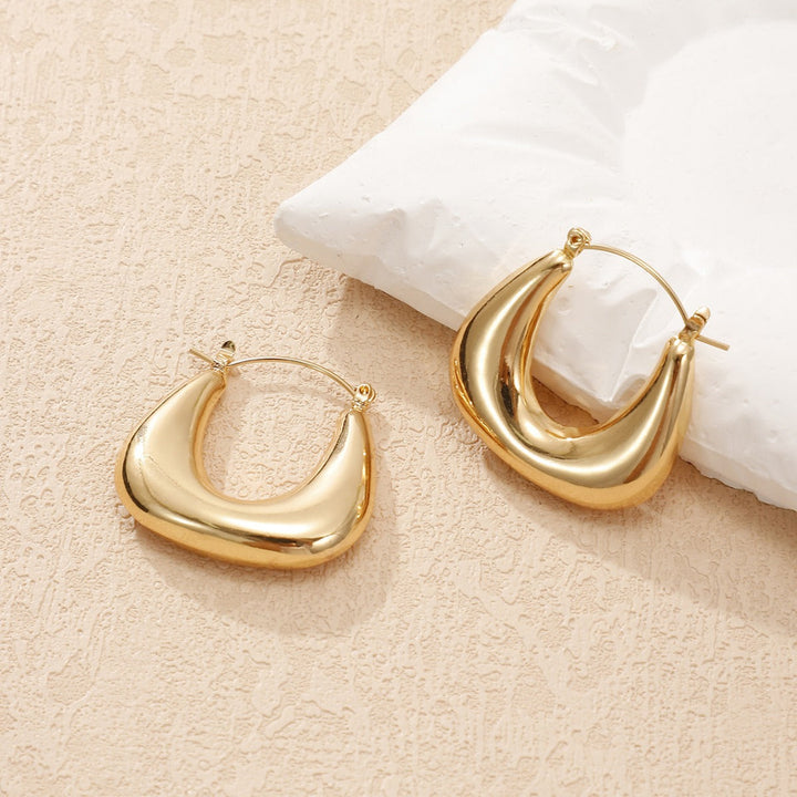 Ladies earrings in a modern, curved design Land Girl