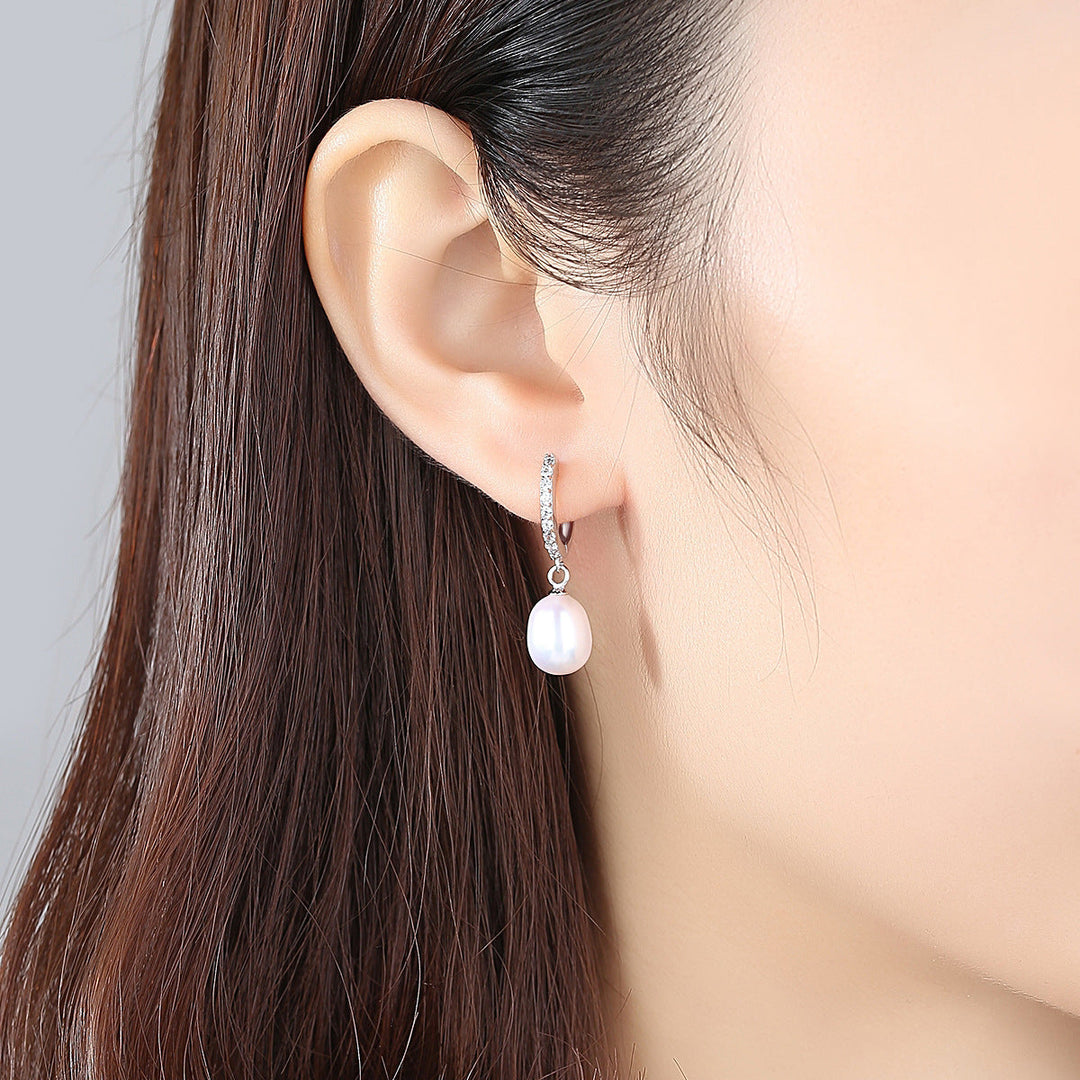Ladies earrings with elegant zirconia decorations and pearl pendants Land Girl