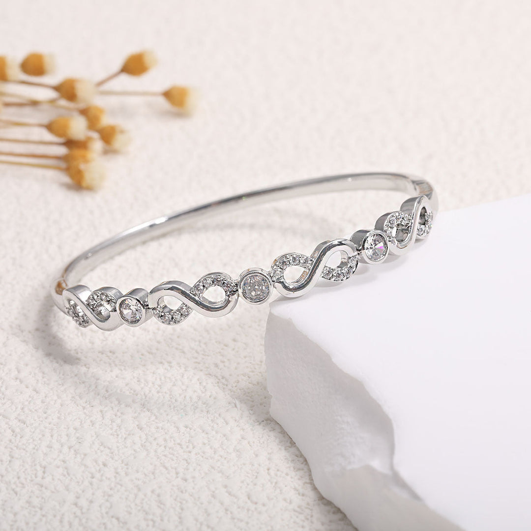 Women's bangle with elegant infinity pattern and sparkling zirconia Land Girl