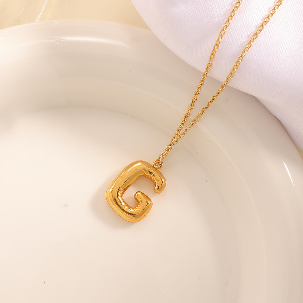 Women's necklace with curved letter pendant Land Girl