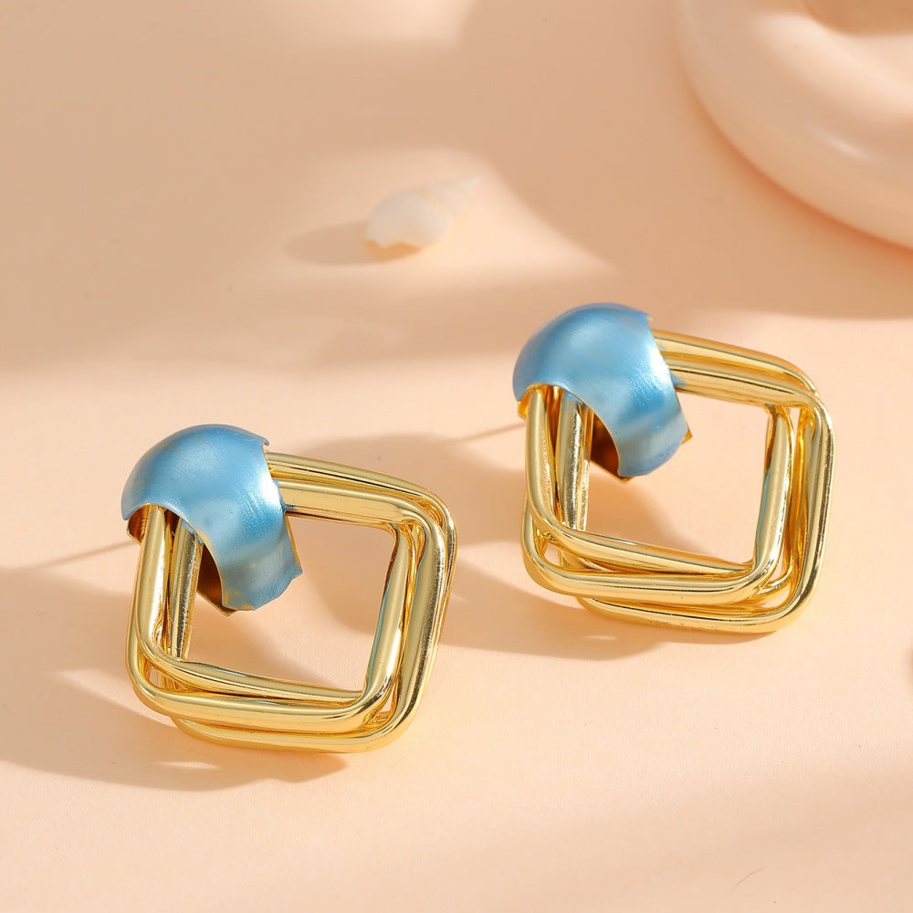 Women modern earrings with asymmetrical design Land Girl