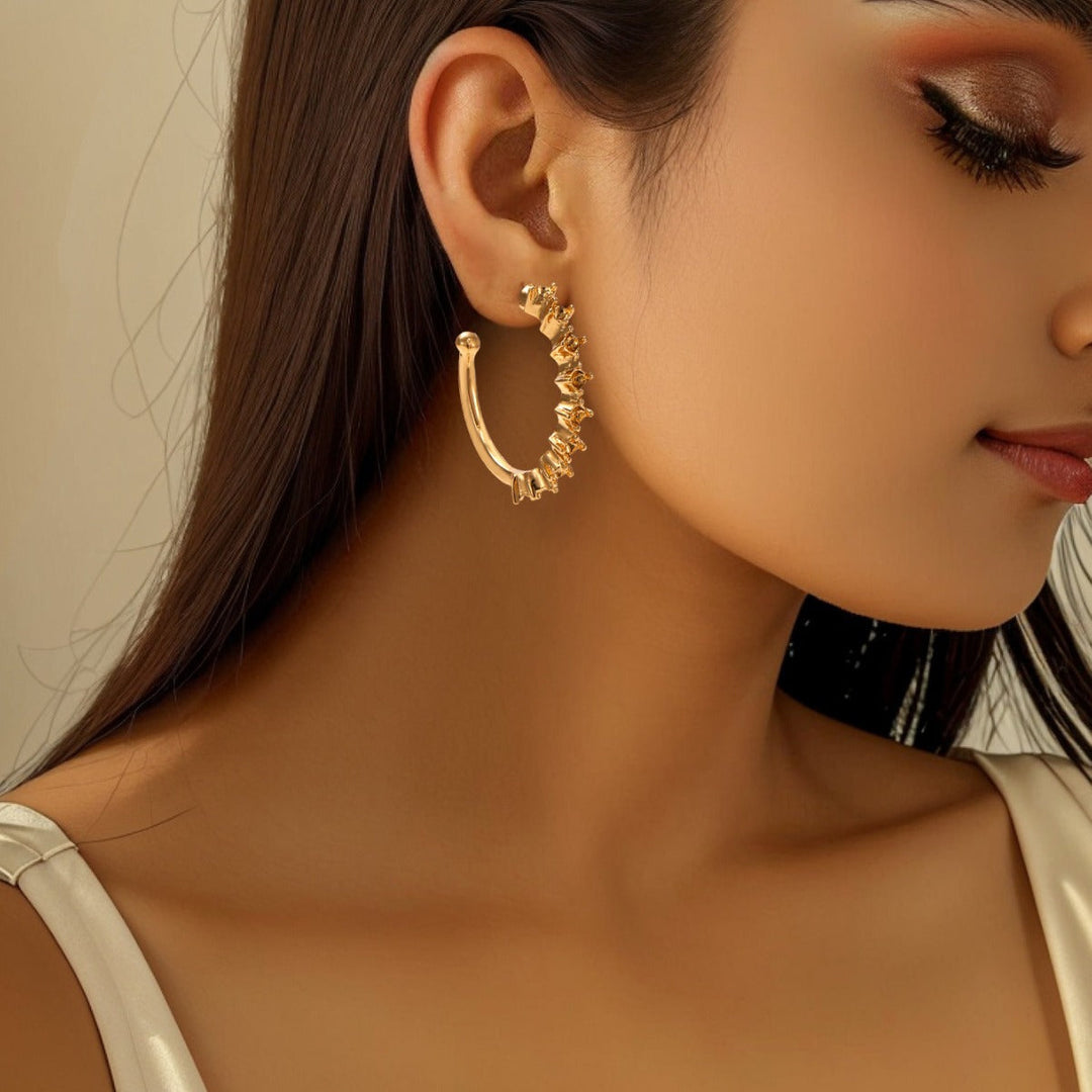 Ladies hoop earrings with intricate structures Land Girl