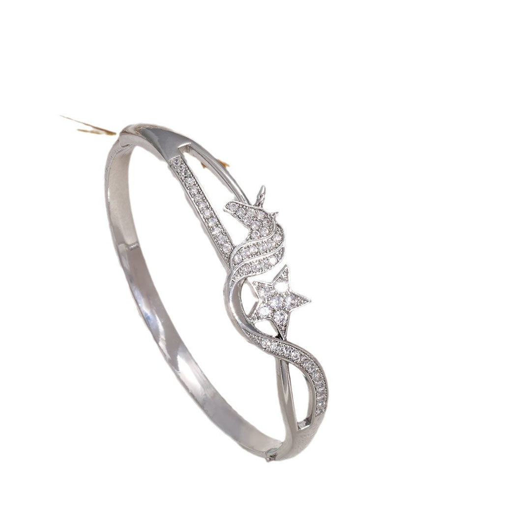 Women's bangle with elegant infinity pattern and sparkling zirconia Land Girl