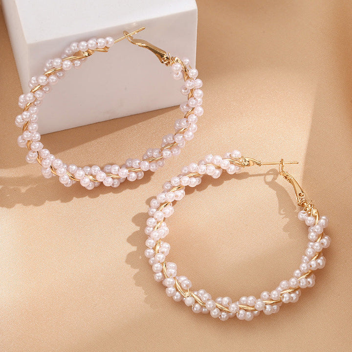 Ladies hoop earrings with luxurious pearl accents and elegant, twisted design Land Girl