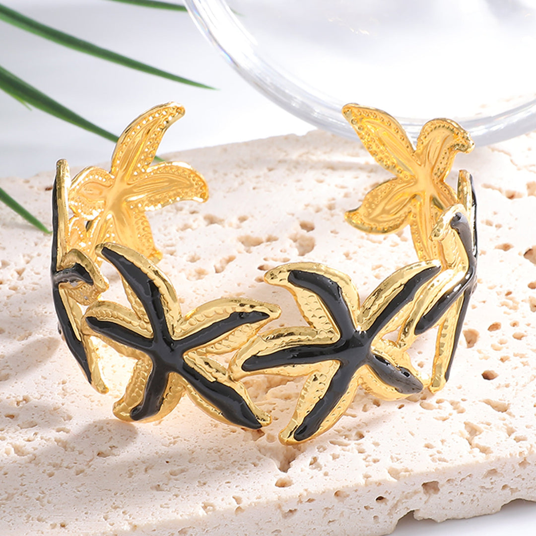 Ladies Open Cuff Bracelet with Expressive Star Motif Land Girl