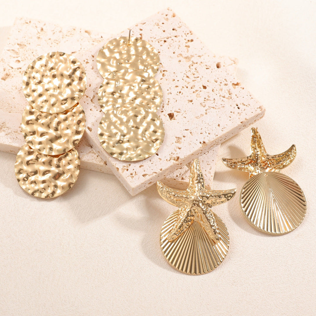 Women's ear clips in luxurious shell and starfish design Land Girl