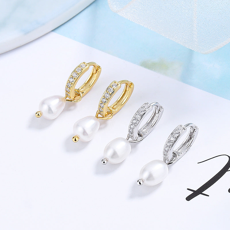 Ladies earrings with elegant zirconia decorations and pearl pendants Land Girl