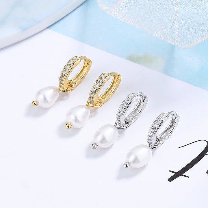 Ladies earrings with elegant zirconia decorations and pearl pendants Land Girl